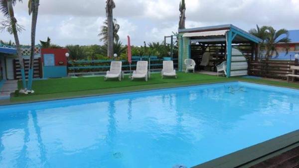 Maison de 3 chambres avec piscine partagee jardin clos et wifi a Sainte Anne a 3 km de la plage