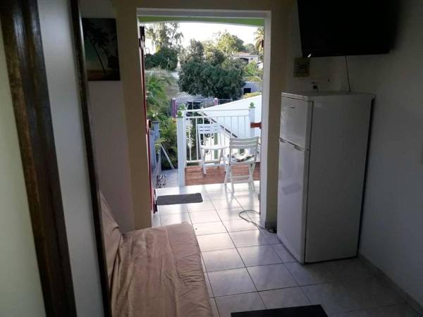 Appartement d'une chambre avec piscine partagee jardin clos et wifi a Sainte Anne a 6 km de la plage