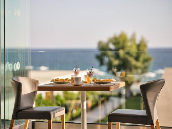 Cavo Orient Beach Hotel & Suites