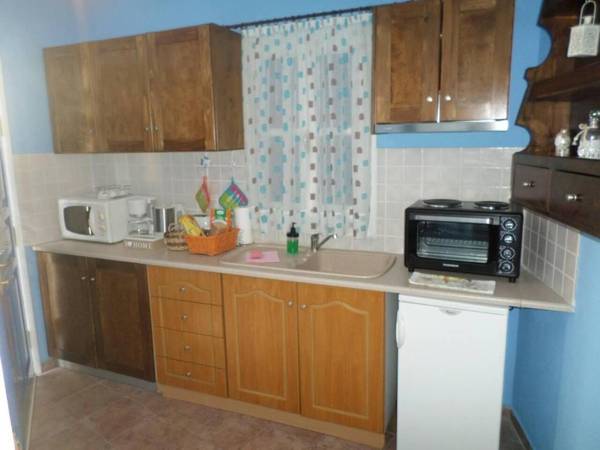 Santorious Flower Covered Apartment