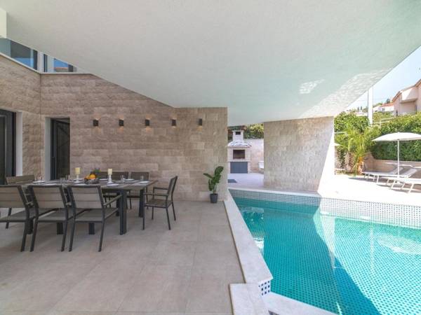 Luxury Villa Trogir 3 with private pool jacuzzi and gym by the beach on Ciovo - Okrug Donji