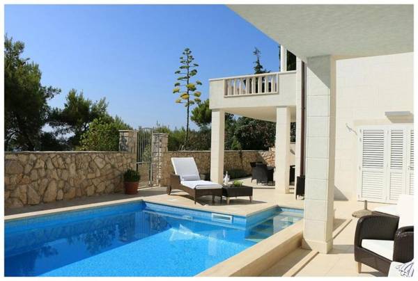 Luxury Beachfront Villa Primosten Oasis with private pool at the beach in Primosten