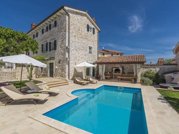 Stone holiday home with private pool and fenced garden near the water park