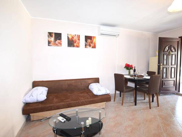 Lovable apartment pool with deckchairs fenced garden with grill wifi and airco