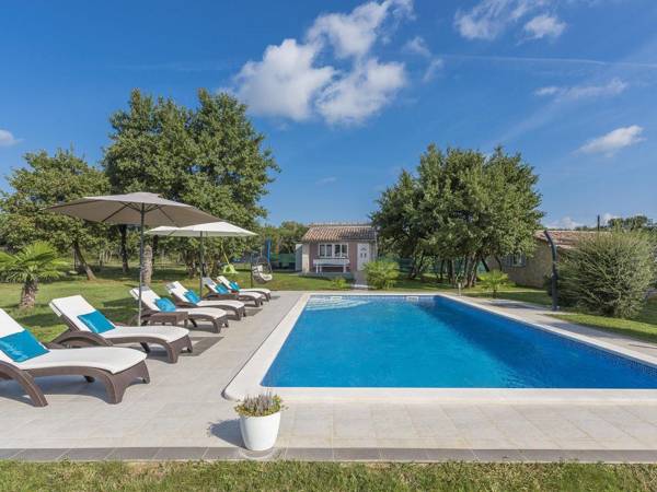 Holiday House with pool garden playground and BBQ - surrounded by nature