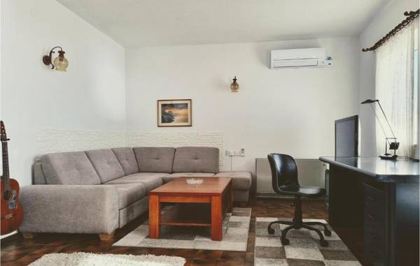 Beautiful apartment in Lokva Rogoznica with WiFi Heated swimming pool and 2 Bedrooms