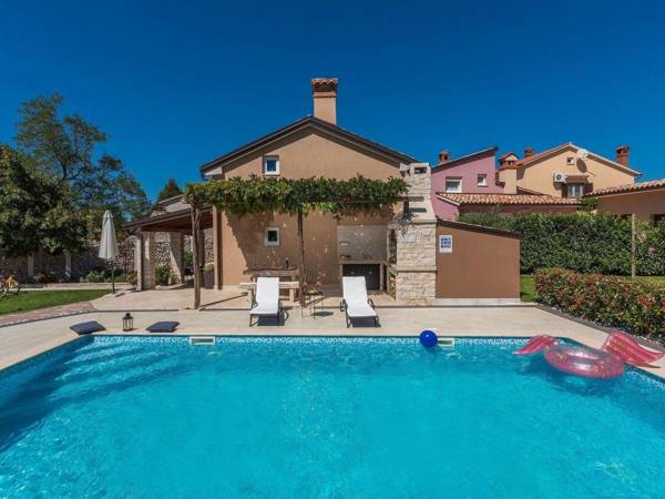 Holiday house with private pool fenced garden and covered barbecue terrace