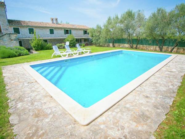 Beautiful holiday Apartment surrounded with a Stone wall with Pool and Garden