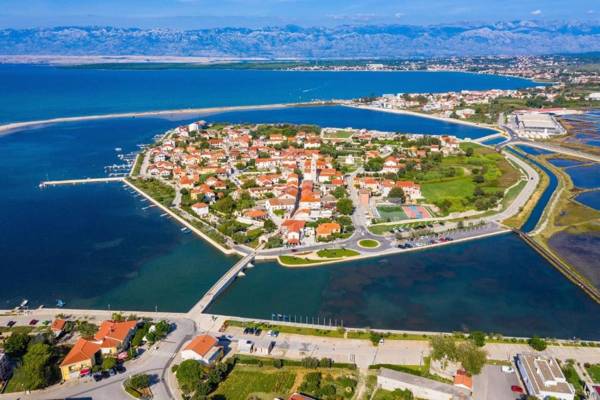 Family friendly apartments with a swimming pool Nin Zadar - 18821