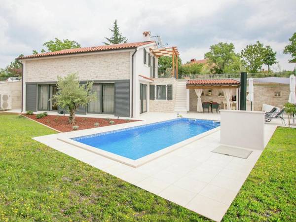 Luxury villa with private pool fenced garden with veranda near Tinjan