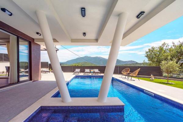 New and stylish Villa Bruna with 32sqm heated pool sauna billiard and media room