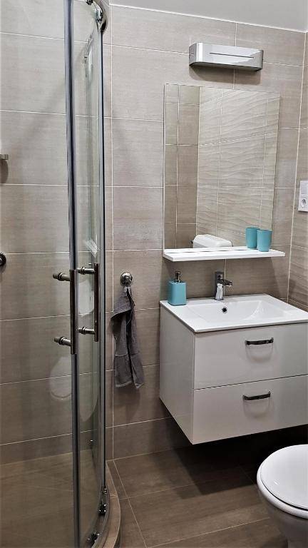 Erdőalja 11 Apartman