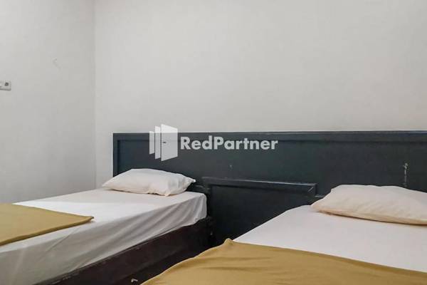 Palu City Guest House RedPartner