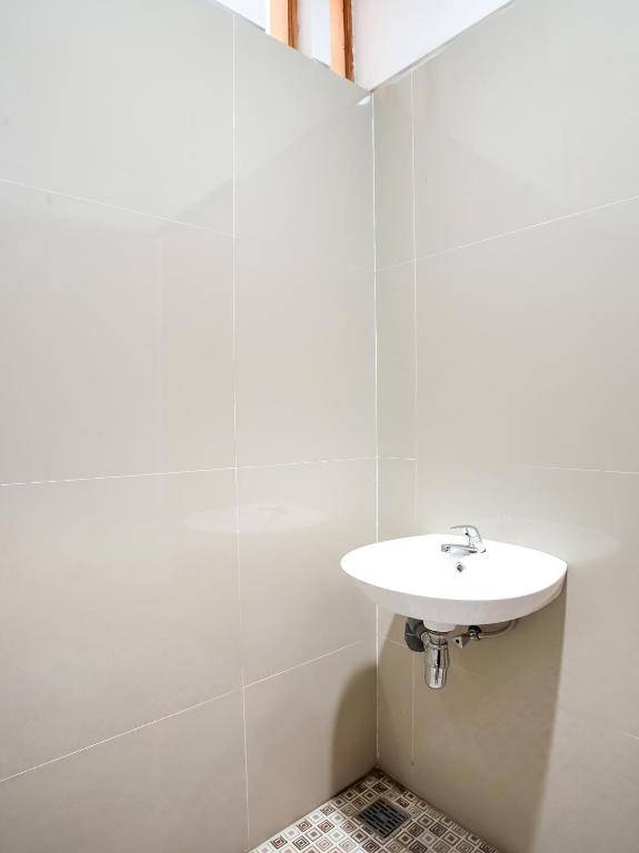 Urbanview Hotel Blok O International