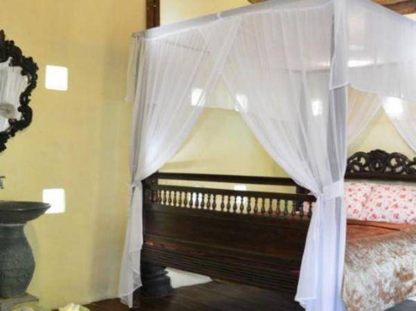 The Riverside Javanese Cottages