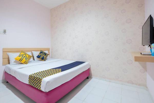 Vaccinated Staff - SPOT ON 2214 Wisma Jampea