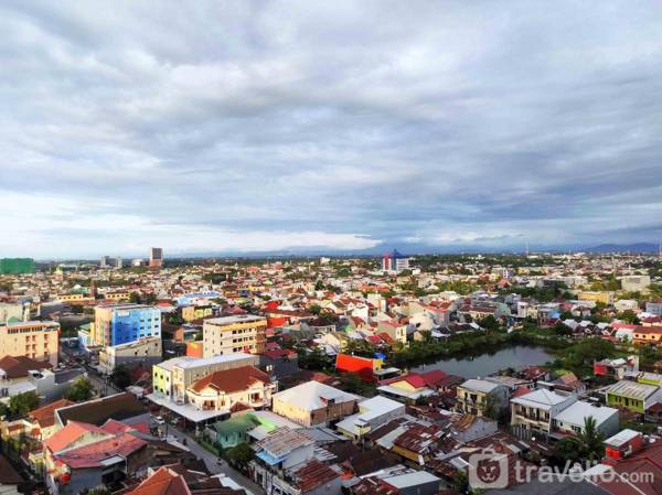 Simply Cozy Studio Vida View Makassar By Travelio