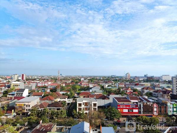 WarmHomey Studio at Vida View Makassar By Travelio