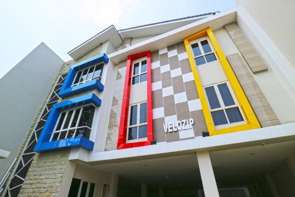 Velozip Kos Exclusive