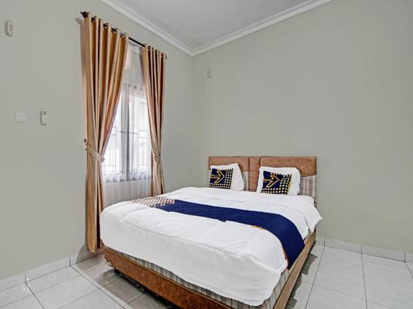 SPOT ON 91645 Rifki Homestay Syariah