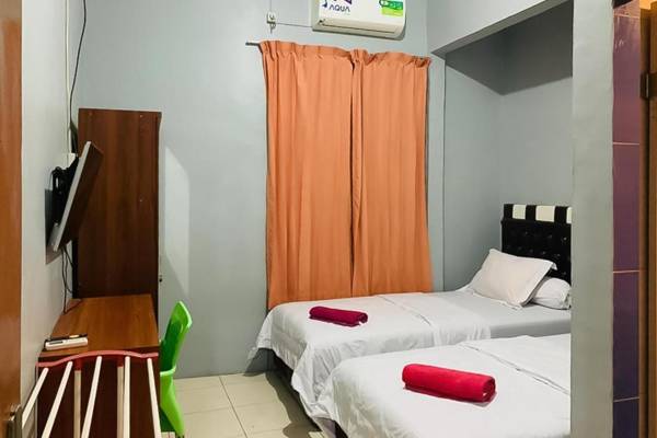 Home Stay Kembar Syariah RedPartner