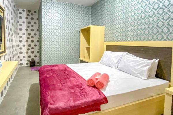 Tini's Guest House Malang RedPartner