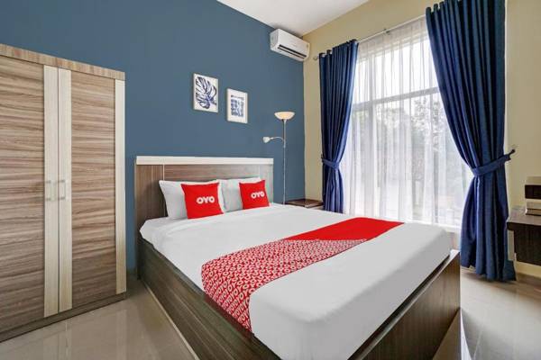 OYO 90580 Ummi Joyogrand Guest House