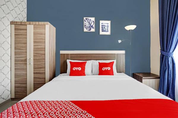 OYO 90580 Ummi Joyogrand Guest House