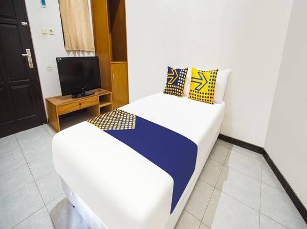 SPOT ON 90902 Marhaban Guesthouse Syariah