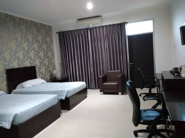 Workspace - Guest House Maliki UIN
