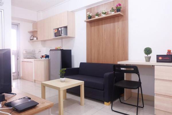 Cozy 2BR Baywalk Green Bay Apartment By Travelio