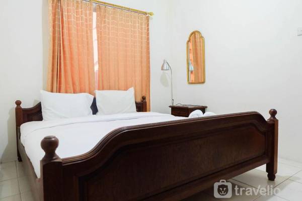 Homey Vintage 2BR @ Sudirman Park Apt By Travelio