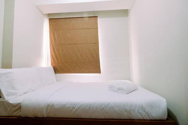 Homey 2BR at Menteng Square Apartment By Travelio