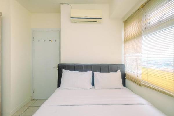 Comfort Green Pramuka 2BR Apartment By Travelio