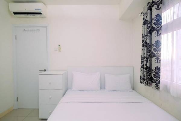 Relaxing 2BR @ Green Pramuka Apartment By Travelio