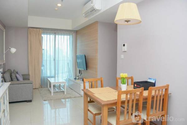 Cozy Stay 2BR at Casa Grande Apartment By Travelio