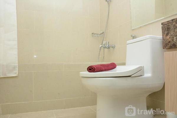 Cozy Stay 2BR at Casa Grande Apartment By Travelio