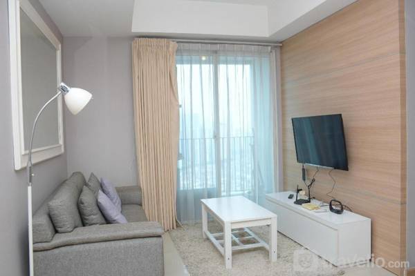 Cozy Stay 2BR at Casa Grande Apartment By Travelio