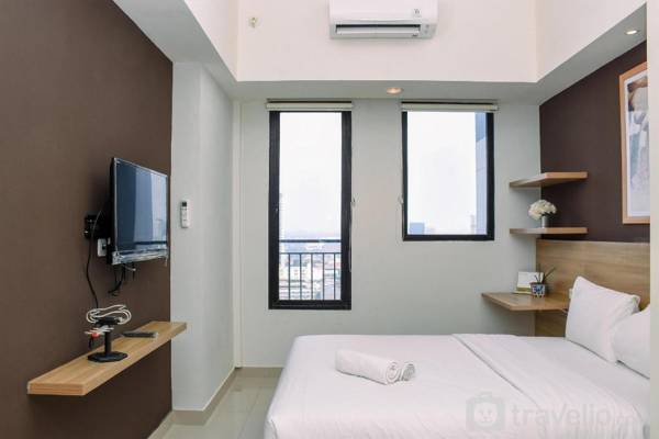 Comfy Studio at Evenciio Apartment By Travelio