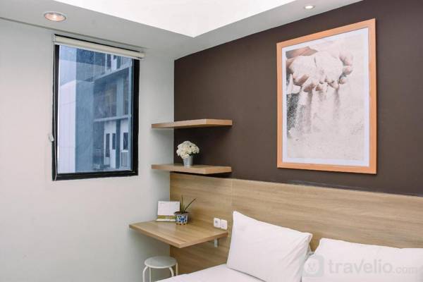 Comfy Studio at Evenciio Apartment By Travelio