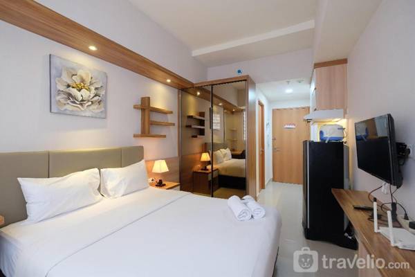 Elegant Studio @ Evenciio Apt Margonda By Travelio