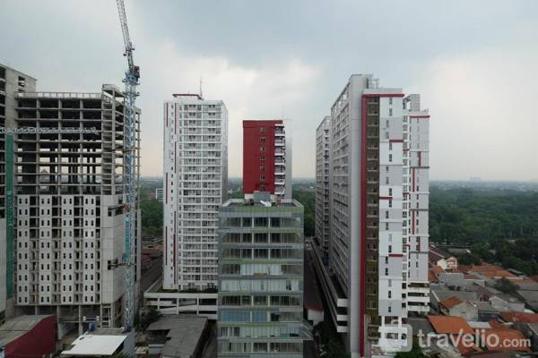 Elegant Studio @ Evenciio Apt Margonda By Travelio