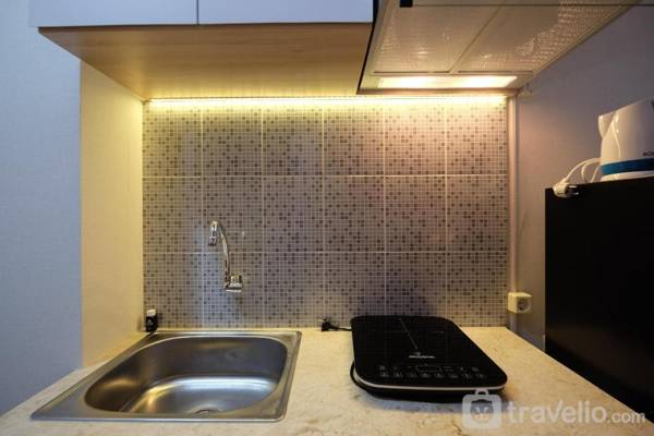 Elegant Studio @ Evenciio Apt Margonda By Travelio