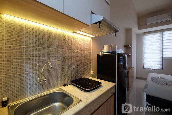 Elegant Studio @ Evenciio Apt Margonda By Travelio