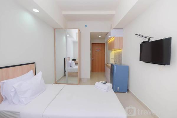 Cozy Studio Evenciio Apartment near UI By Travelio