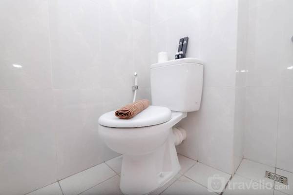 Cozy Studio Evenciio Apartment near UI By Travelio