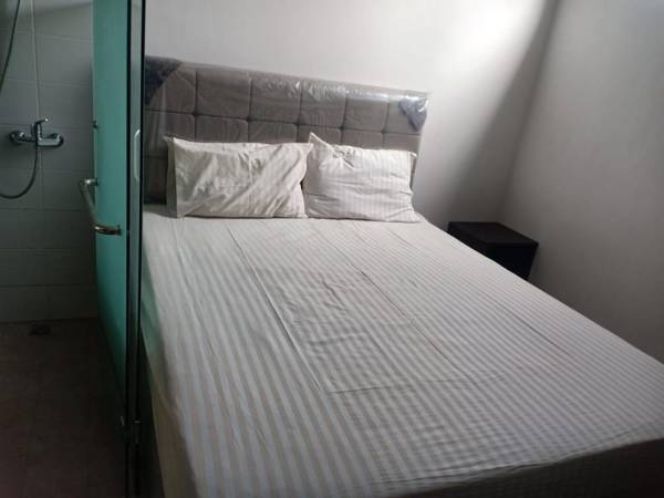 OYO 91007 Mangga Besar House