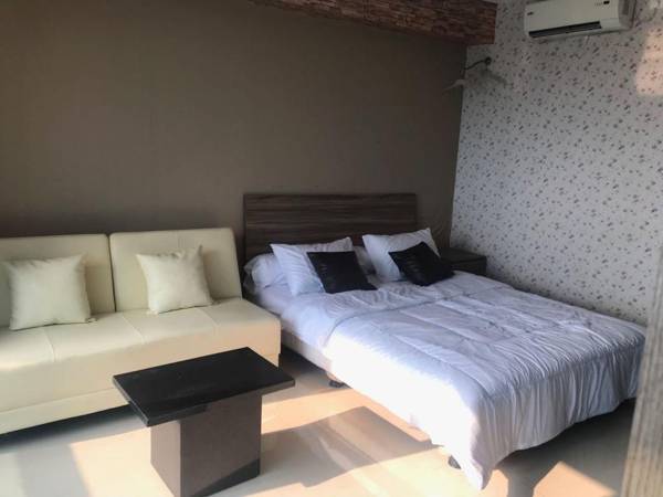 Comfy Wooden Decorated Studio - The Hive Cawang