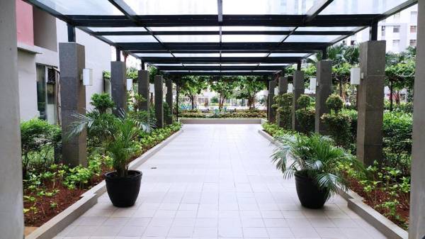 Warm and Nice 1BR at Green Bay Pluit Apartment By Travelio