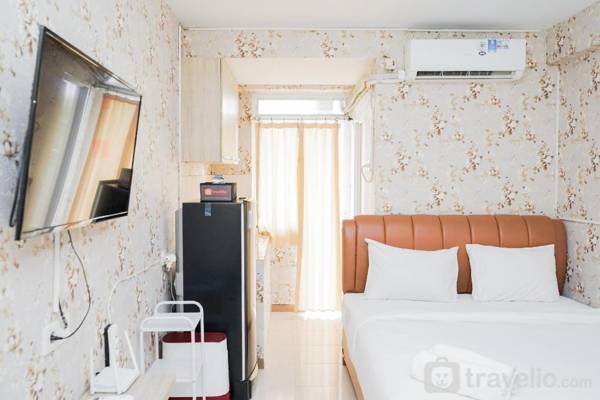 Homey Studio at Green Palm Residence By Travelio